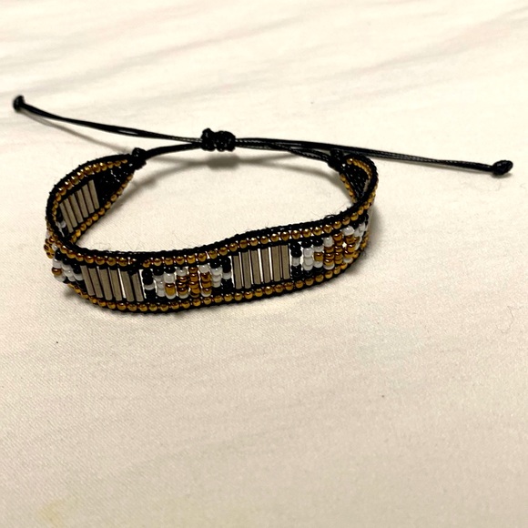 Jewelry - Gold black white and silver beads on black cord Adjustable Size Bracelet.